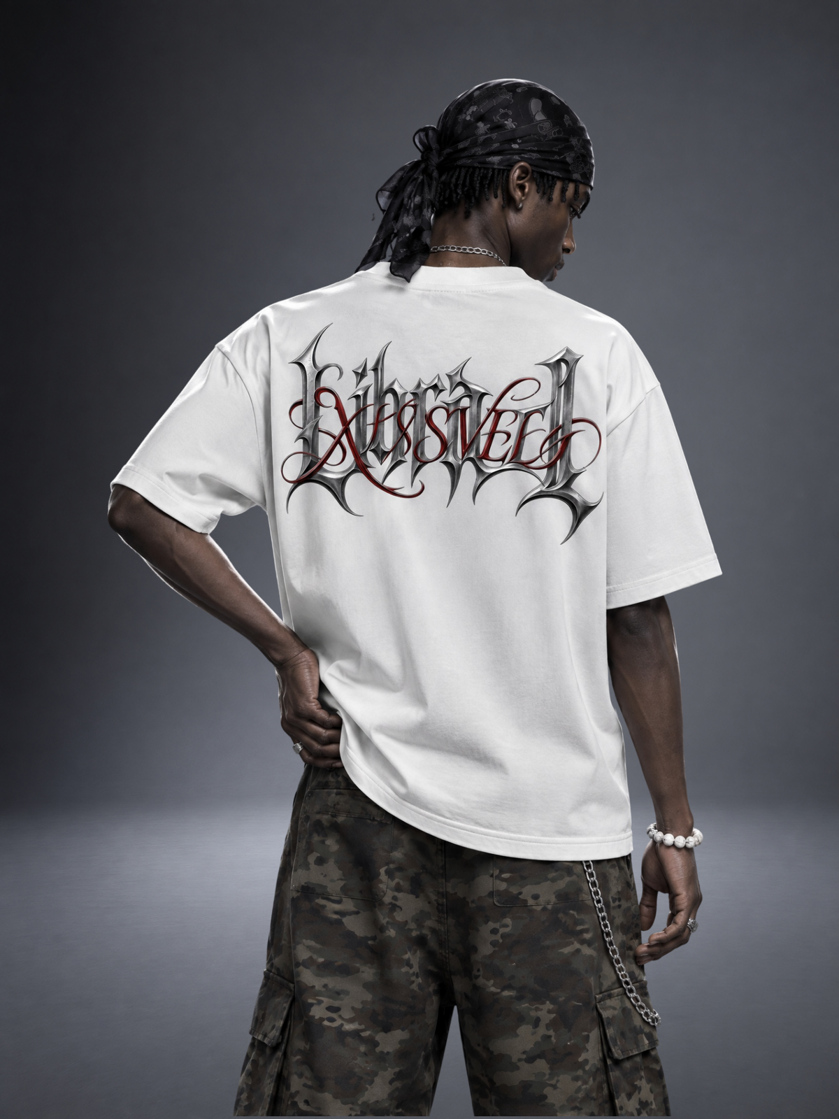 Libra zodiac white graphic tee - gothic 'Libra' lettering with red XISVEL script across the back