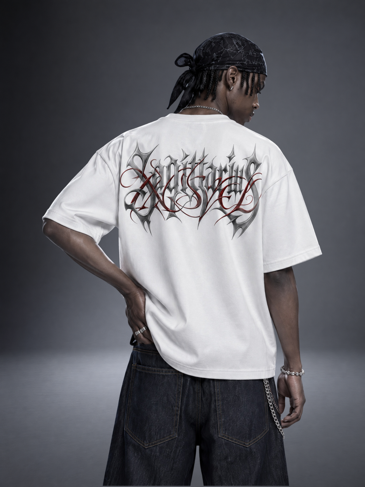 Sagittarius zodiac white graphic tee - gothic 'Sagittarius' lettering with red XISVEL script across the back