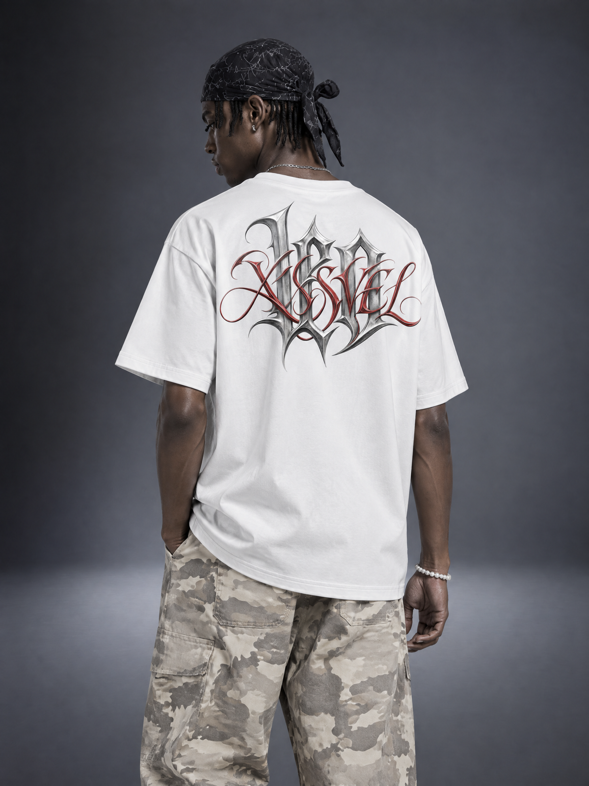 Leo zodiac white graphic tee - gothic 'Leo' lettering with red XISVEL script across the back